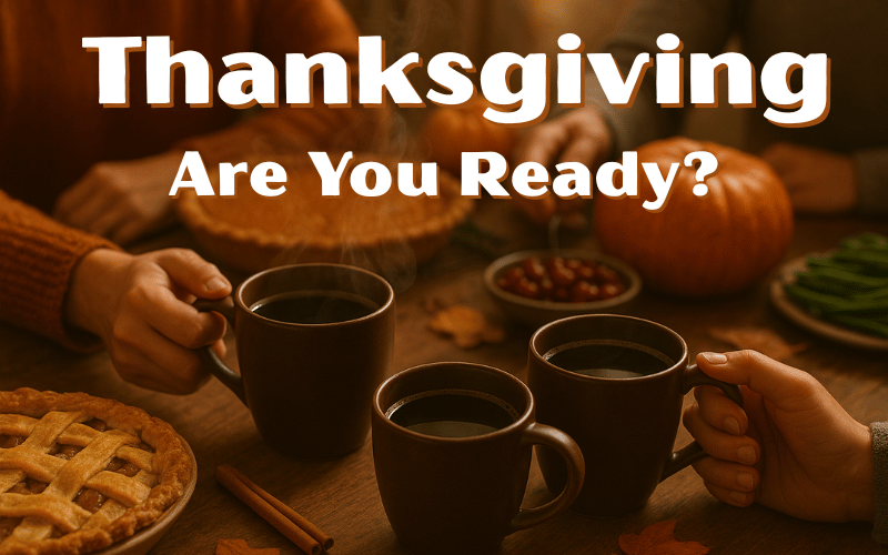 People enjoying Thanksgiving with pies, pumpkins, and coffee mugs on a table.