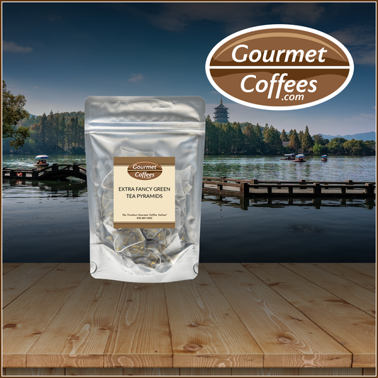 Packaged tea with 'Gourmet Coffees' branding against a scenic lake background