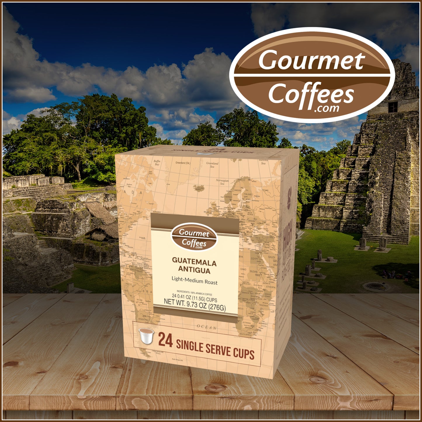 Box of Gourmet Coffees Guatemala Antigua coffee on a wooden surface with a temple and trees in the background.